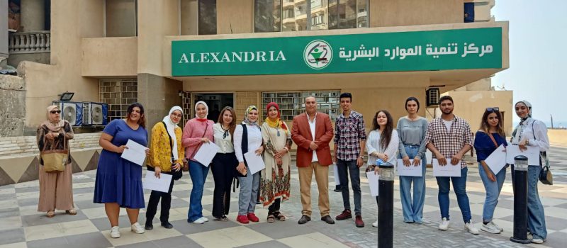 Painting department students decorating the interior space of the Human Resources Development Center in Alexandria with artistic works